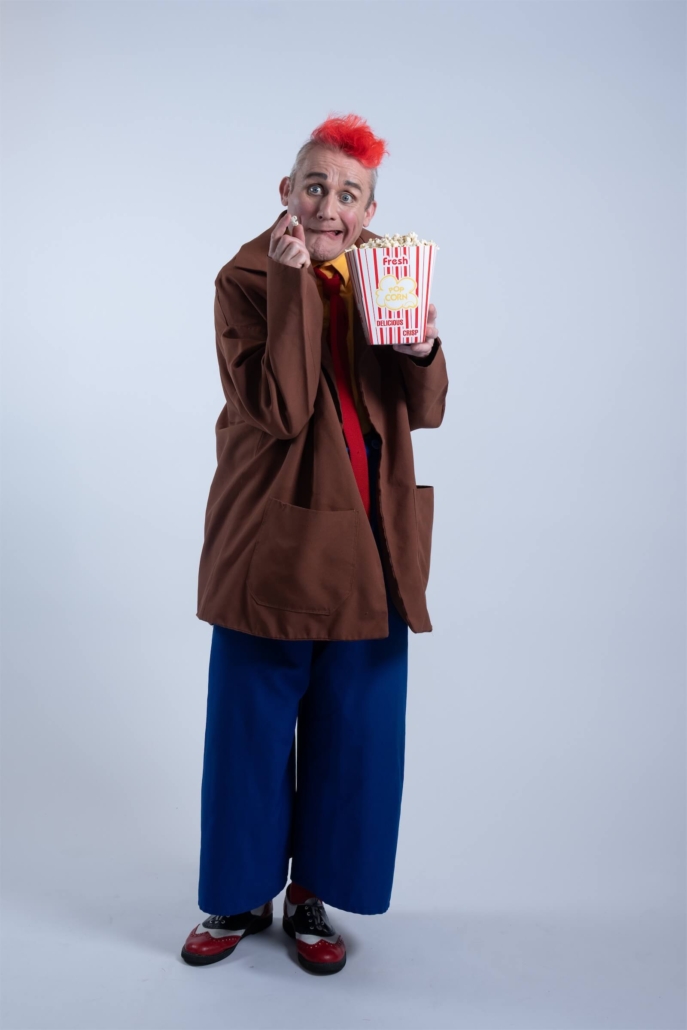 Tweedy eating popcorn